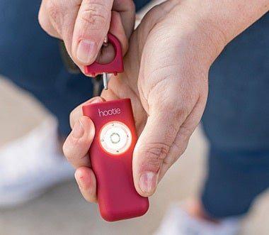Pulling Hootie's pin to activate the alarm